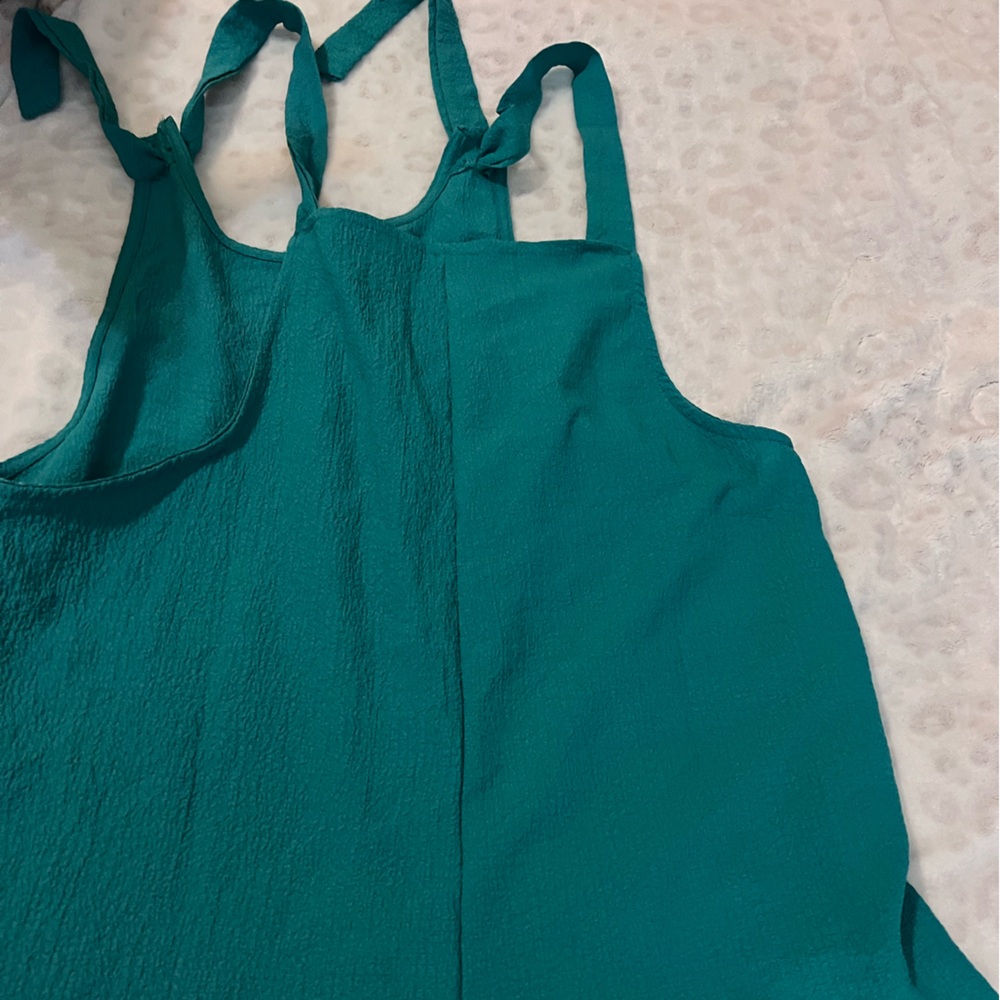 Women’s overall shorts size large. Green in color